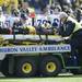Michigan running back Fitzgerald Toussaint is taken off the field after suffering an injury during the first quarter at Michigan Stadium. Melanie Maxwell I AnnArbor.com